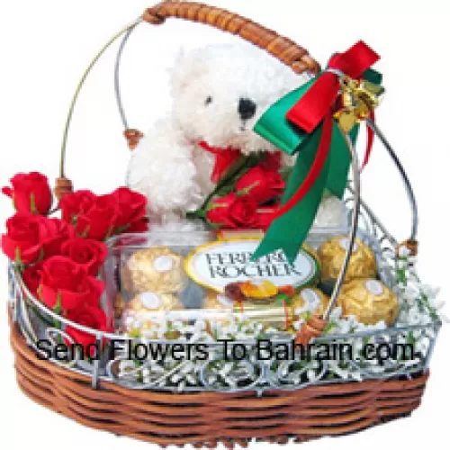 Un magnifique panier composé de roses, 16 pièces de Ferrero Rocher et un mignon ourson blanc