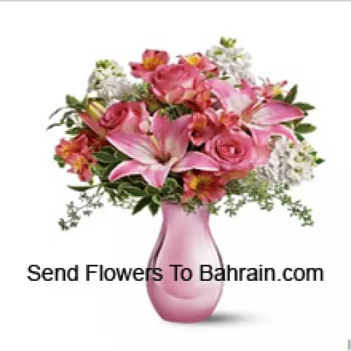 Pink Roses, Pink Lilies And Assorted White Flowers With Some Ferns In A Glass Vase