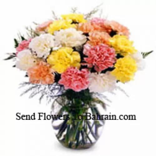 12 Mixed Colored Carnations In A Vase