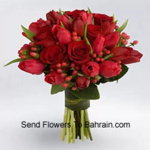 Bunch Of Red Roses And Red Tulips With Red Seasonal Fillers. This Is The Hottest Selling Product This Valetine Season